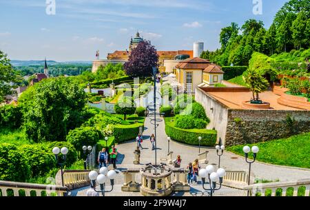 MELK, AUSTRIA, MAY 16, 2015: People are walking towards the main entrance of melk abbey in austria Stock Photo