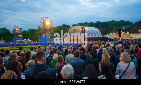 VIENNA, AUSTRIA, JUNE 08, 2015: People are enjoying a concert of classical music held in schonbrunn garden which takes place once a year during summer Stock Photo