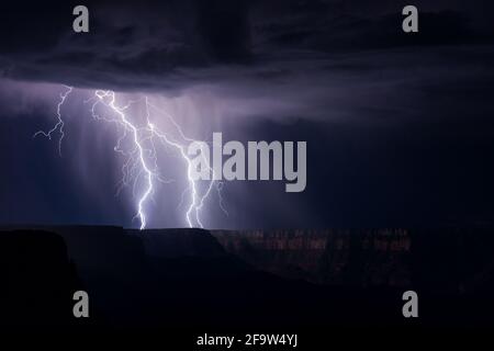 Lightning strikes the South Rim from a thunderstorm in Grand Canyon National Park, Arizona Stock Photo