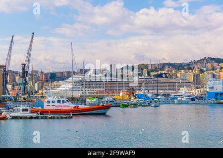GENOA, ITALY, MARCH 13, 2016: view of a cruise ship anchoring in the port of genoa in italy. Stock Photo