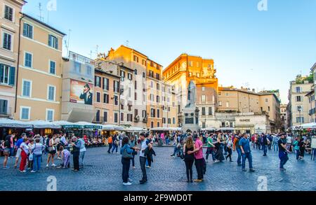 ROME, ITALY, JUNE 1, 2014: people are strolling through famous piazza farnese in italian capital rome. Stock Photo