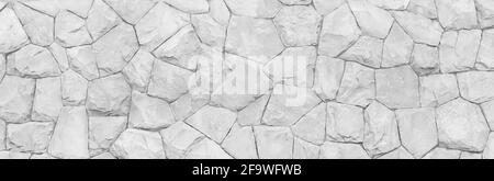 Panorama white stone wall for background for design in your work. Stock Photo