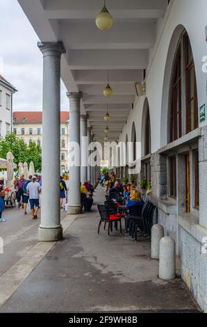 LJUBLJANA, SLOVENIA, JULY 29, 2015:Ljubljana Market arcade on the Ljubljanica river Stock Photo