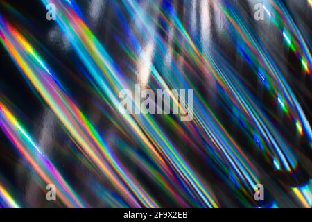 Abstract colorful holographic striped background. Futuristic blurred texture. Stock Photo