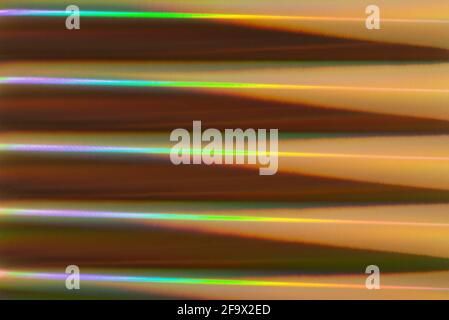 Abstract colorful holographic striped background. Futuristic blurred texture. Stock Photo