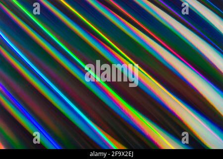 Abstract colorful holographic striped background. Futuristic blurred texture. Stock Photo