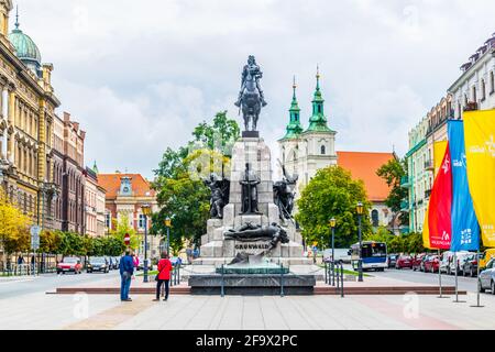 KRAKOW, POLAND, AUGUST 11, 2016: People are standing in front of the Grunwald monument in Krakow, Poland. Stock Photo