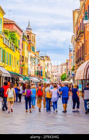 VENICE, ITALY, SEPTEMBER 20, 2015: people are strolling over strada nuova street in italian city venice, which belongs to the main streets of the city Stock Photo