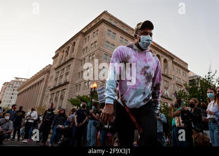 Washington, DC, USA, 20 April, 2021.  Pictured: A man dances in Black Lives Matter Plaza, surrounded by media, to celebrate the conviction of former police officer Derek Chauvin for the murder of George Floyd.  Credit: Allison C Bailey/Alamy Live News Stock Photo