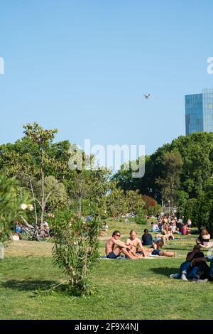 BARCELONA, SPAIN - JUNE 08, 2019: People Having Picnic And Relaxing On Summer Day In Parc de la Ciutadella Or Citadel Park In Barcelona Stock Photo