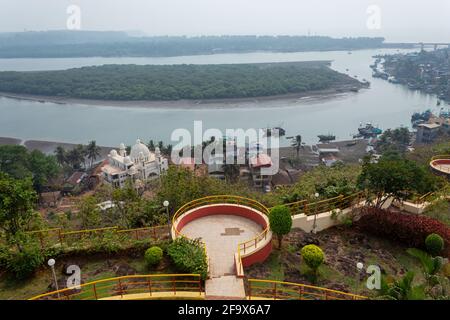 View from Thiba point of  Kajali River Estuary, Adampur Jama Masjid and the mangroves, Ratnagiri, Maharashtra, India. Stock Photo