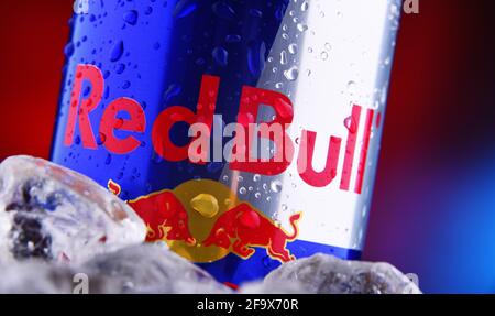 POZNAN, POL - FEB 25, 2021: Can of Red Bull, an energy drink sold by Red Bull GmbH, an Austrian company created in 1987 Stock Photo