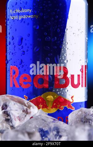 POZNAN, POL - FEB 25, 2021: Can of Red Bull, an energy drink sold by Red Bull GmbH, an Austrian company created in 1987 Stock Photo