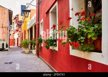 Among the colorful alleys of Caorle Stock Photo