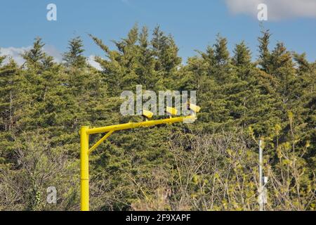 Average speed cameras above a motorway M27 Hampshire Stock Photo