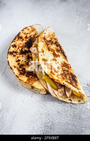 Cheesy Chicken roast Quesadilla. White background. Top view Stock Photo