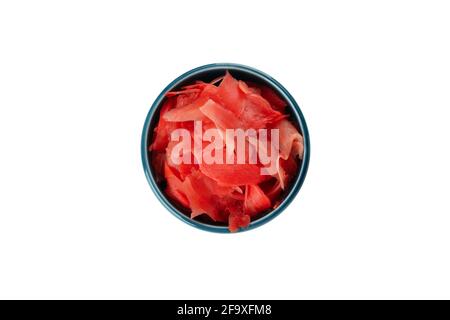 Bowl with red pickled ginger isolated on white background. Bowl of red pickled ginger, Japanese sushi condiment isolated on white Stock Photo