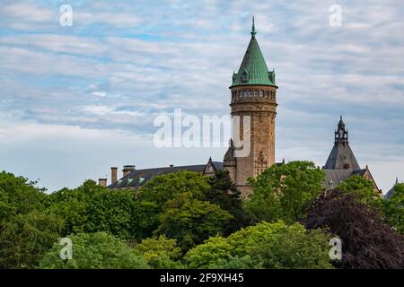 A picture of the Bank Museum Luxembourg's tower and rooftops as seen from afar. Stock Photo