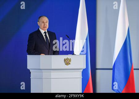 Moscow, Russia. 21st Apr, 2021. Russian President Vladimir Putin delivers his annual address to the Federal Assembly in Moscow, Russia, April 21, 2021. Credit: Evgeny Sinitsyn/Xinhua/Alamy Live News Stock Photo