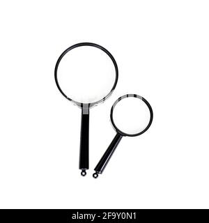 Black magnifying glass isolated on white background. Stock Photo