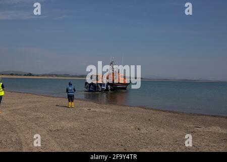 RNLI Shannon class lifeboat preparing to launch from trailer on the beach at Pwllheli, Wales Stock Photo