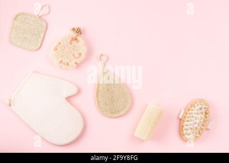 Reusable items for beauty treatment from organic biodegradable material on pink backdrop. Stock Photo