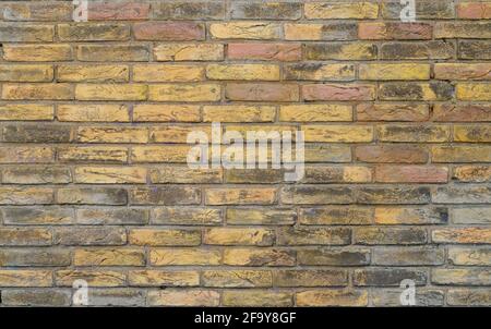 grungy old brick wall background red and orange bricks Stock Photo