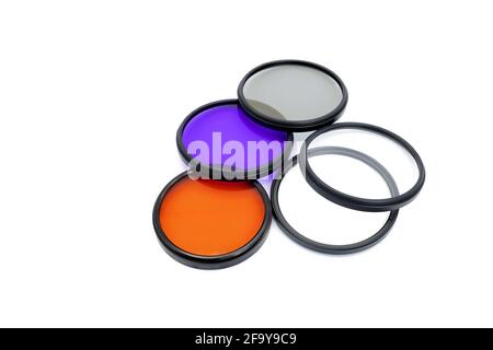 Photographic filters of various colors on a white background Photography concept Stock Photo