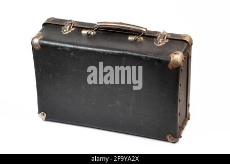 Old closed suitcase isolated on the white background Stock Photo