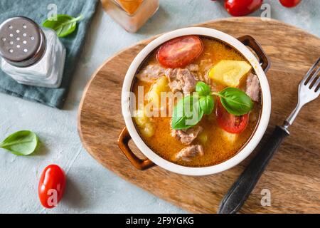 Turkey stew in tomato sauce with zucchini Stock Photo