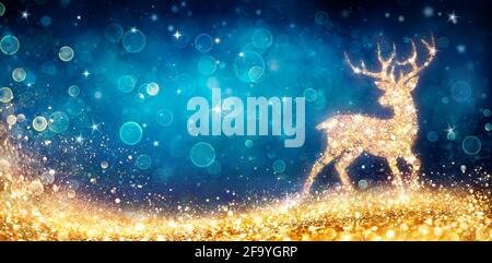 Christmas - Magic Golden Deer In Shiny Blue Background Stock Photo