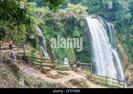 PULHAPANZAK, HONDURAS - APRIL 18, 2016 Tourists observe Pulhapanzak waterfall Stock Photo