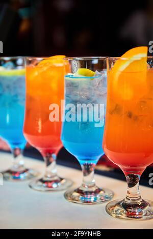 Multicolored alcoholic and non-alcoholic cocktails with ice Stock Photo