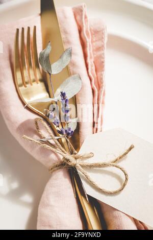 Close up view on table setting details on white plates. Stock Photo