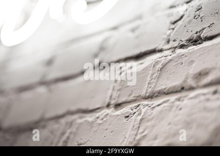 Close up view of textured brick wall with illumination Stock Photo