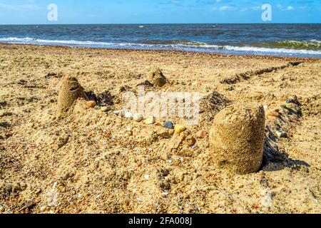 A sandcastle on the beach at Old Hunstanton, Norfolk. Stock Photo