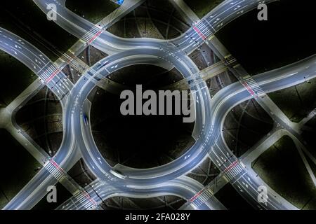 Arial top view of Modern transportation with Expressway, Road and Roundabout,Road traffic, multilevel junction highway-Top view in asia. Important inf Stock Photo