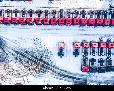 Aerial top view of new truck cars parking for sale stock lot row, dealer inventory import and export business commercial, Automobile and automotive in Stock Photo