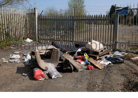 Fly tipping at the side of the road Stock Photo