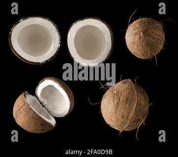 Coconut divided into two equal parts, view from the top, on a black background, collage Stock Photo