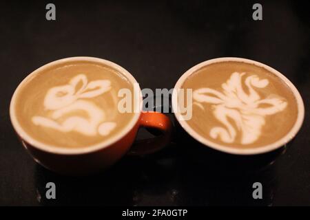 Close-up image of rabbit and swan latte art. Stock Photo