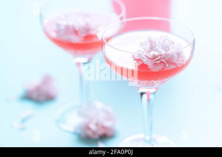 Rosé cocktails  with a flower garnish Stock Photo