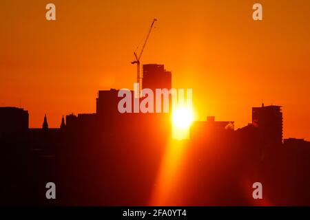 Sunrise behind Leeds City Centre skyline.Yorkshire's tallest building 'Altus House' is currently under construction Stock Photo