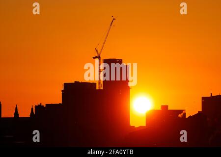 Sunrise behind Leeds City Centre skyline.Yorkshire's tallest building 'Altus House' is currently under construction Stock Photo