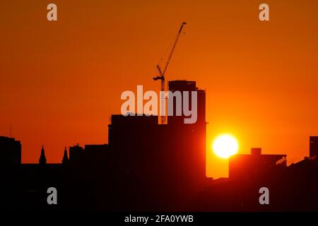 Sunrise behind Leeds City Centre skyline.Yorkshire's tallest building 'Altus House' is currently under construction Stock Photo