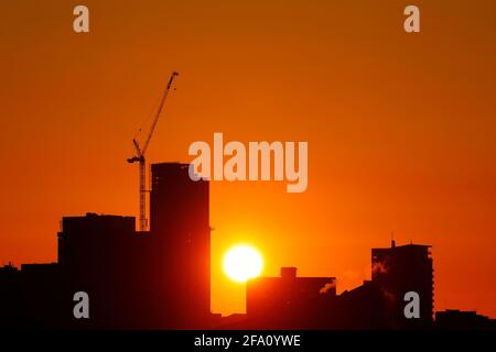 Sunrise behind Leeds City Centre skyline.Yorkshire's tallest building 'Altus House' is currently under construction Stock Photo