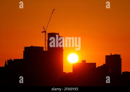 Sunrise behind Leeds City Centre skyline.Yorkshire's tallest building 'Altus House' is currently under construction Stock Photo