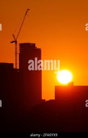 Sunrise behind Leeds City Centre skyline.Yorkshire's tallest building 'Altus House' is currently under construction Stock Photo