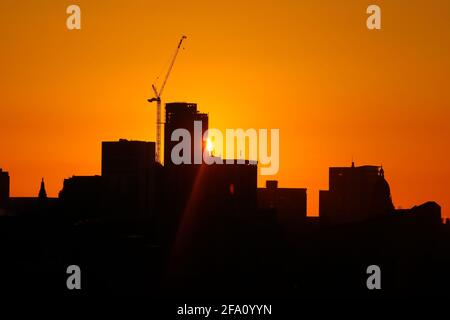 Sunrise behind Leeds City Centre skyline.Yorkshire's tallest building 'Altus House' is currently under construction Stock Photo