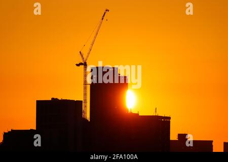 Sunrise behind Leeds City Centre skyline.Yorkshire's tallest building 'Altus House' is currently under construction Stock Photo